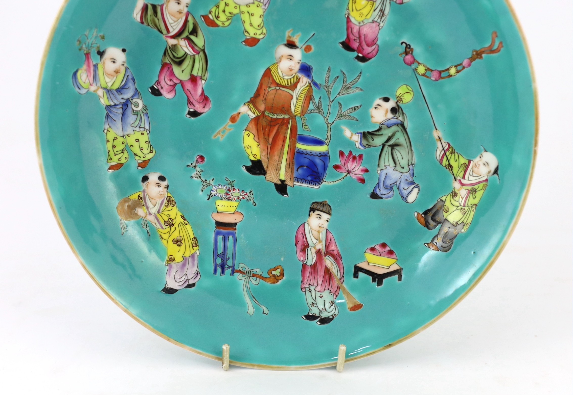 A Chinese turquoise ground 'Boys' dish, Jiaqing seal mark but Republic period, 23.5cm diameter, two hairline cracks